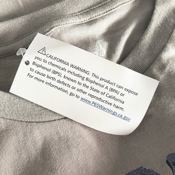 NWOT Dolly Parton Sparkle Mesh Sleeve Graphic T-Shirt XS - Picture 7 of 9